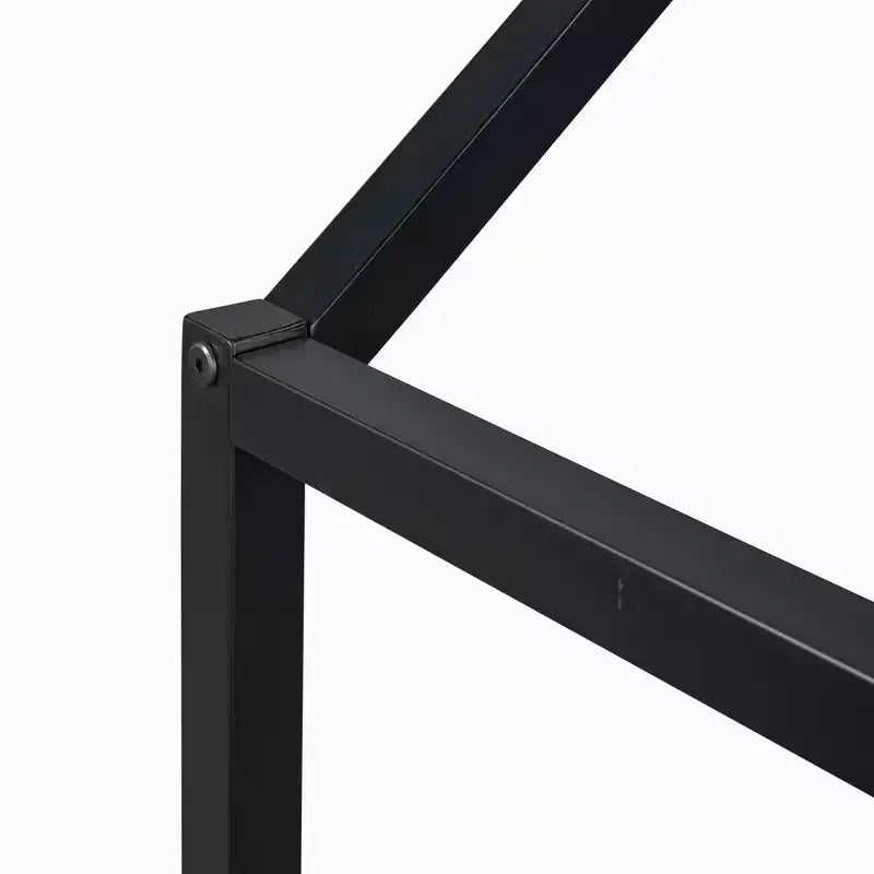 Letto a terra in metallo a forma di casetta bianco e nero con porta e ringhiere per bambini e ragazzi
